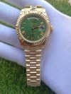 Rolex DayDate Gold Green Roman Dial 41MM President Fluted Bezel Men's Watch - Image 7