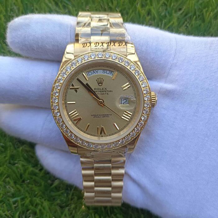 Rolex DayDate ii Stainless Steel Yellow Gold Champagne With Diamond Bezel And 41MM Roman Dial President Bracelet Watch - Image 2