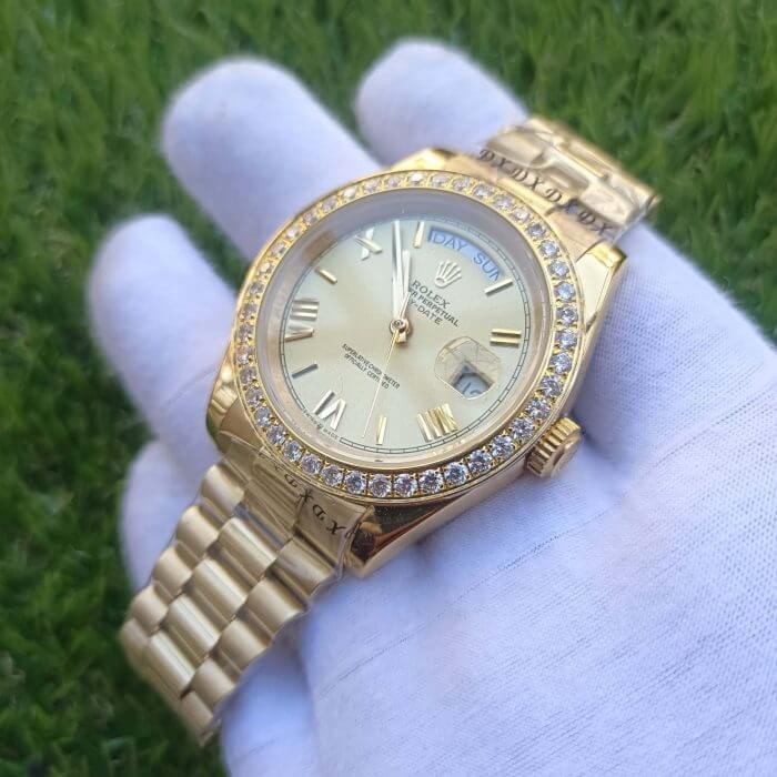 Rolex DayDate ii Stainless Steel Yellow Gold Champagne With Diamond Bezel And 41MM Roman Dial President Bracelet Watch - Image 4