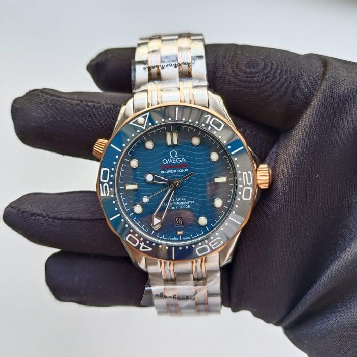 Omega Seamaster 300m on wrist | 42MM Blue Dial Rose Gold | Two Tone Bracelet Watch - Image 3